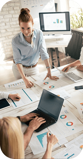 Professional working at desk with analytics